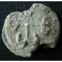 Théodore. Sceau byzantin en plomb (Ø 17/22 mm, 7,85 g). VIᵉ–VIIᵉ siècle.