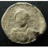 Kottanos. Tessère byzantine en plomb (Ø 15 mm, 3,47 g). VIᵉ siècle.