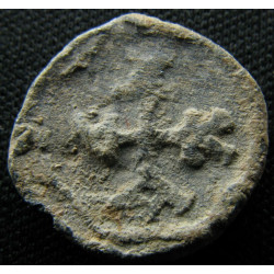 Kottanos. Tessère byzantine en plomb (Ø 15 mm, 3,47 g). VIᵉ siècle.