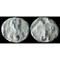 Isidoros. Sceau byzantin en plomb (Ø 16 mm, 5,69 g). VIᵉ siècle.