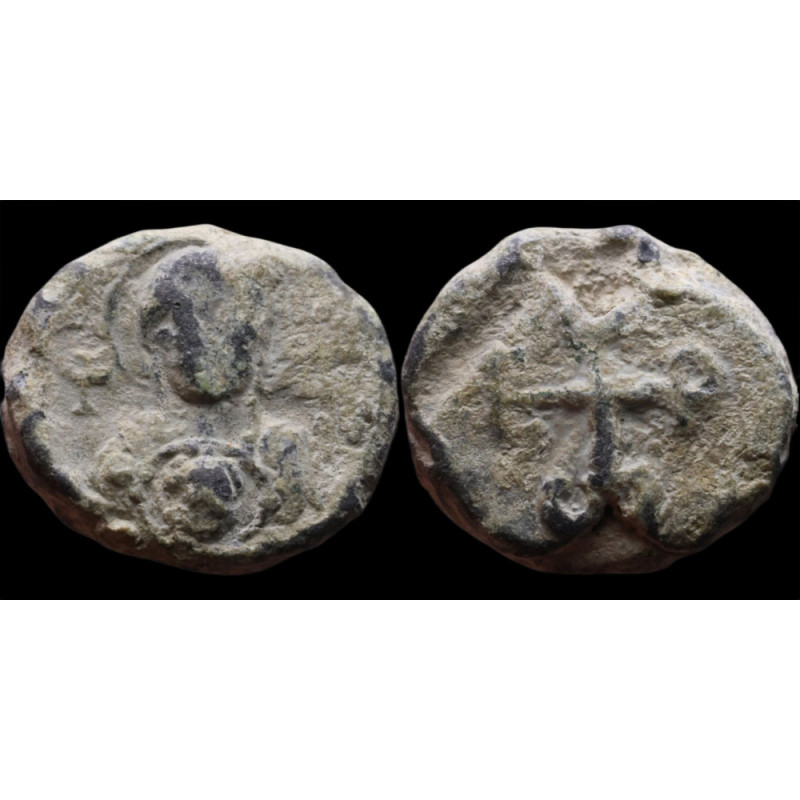 Isidoros. Sceau byzantin en plomb (Ø 16 mm, 5,69 g). VIᵉ siècle.