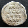 Théoktistos, protonotaire. Sceau byzantin en plomb (Ø 20 mm, 5,19 g). IXᵉ siècle.