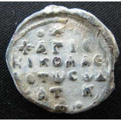 Katakalôn (Nicolas ?). Sceau byzantin en plomb (Ø 22,5 mm, 8,38 g). XIe-XIIe siècle.