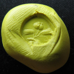 Intaille romaine en cornaline, coquelicot et épis au-dessus d'un phallus