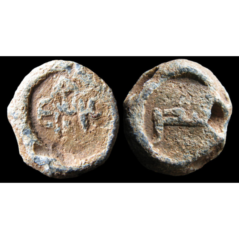 Badr (?). Sceau islamique en plomb à monogramme grec (Ø 18 mm, 9,88 g). Époque byzantine.